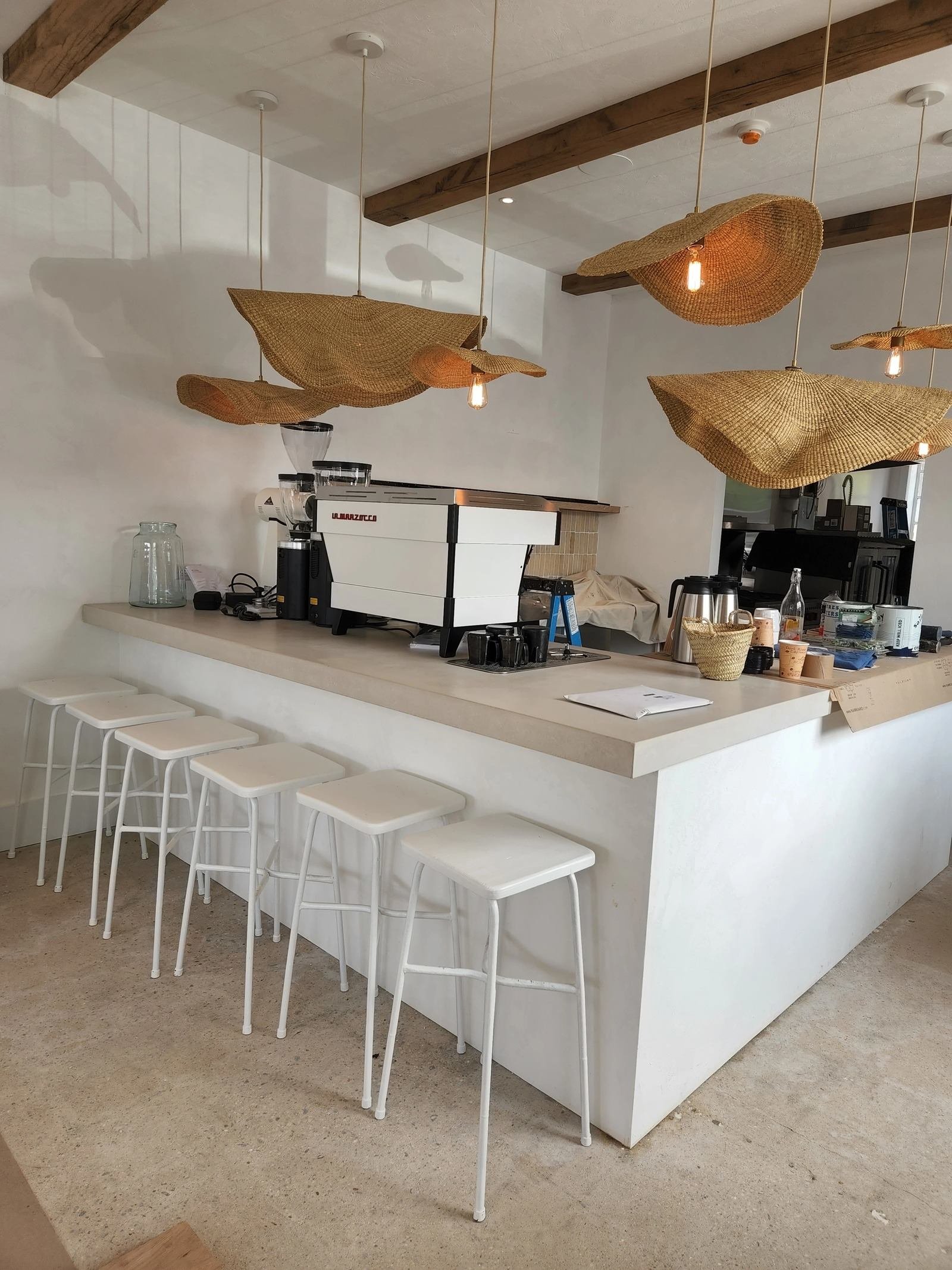 Concrete Encounter cast a light concrete countertop bar in a coffee shop